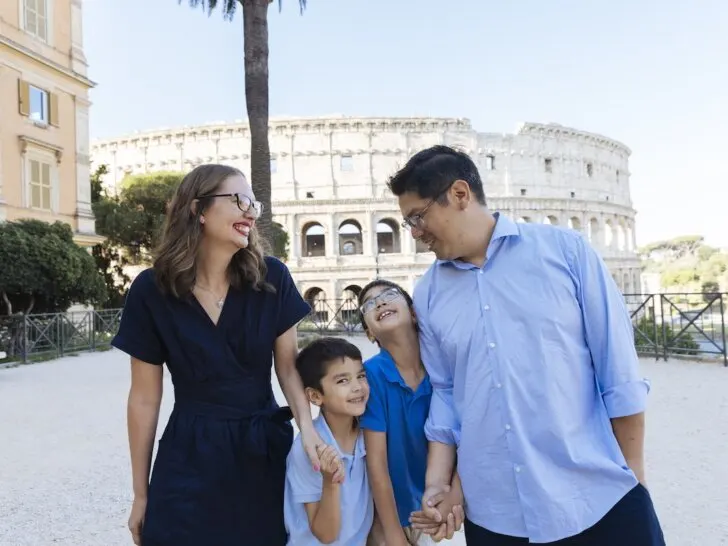 Check out these tips for finding affordable Rome photographers by top family travel blog Marcie in Mommyland. Image of a family in front of the Colosseum in Rome Italy