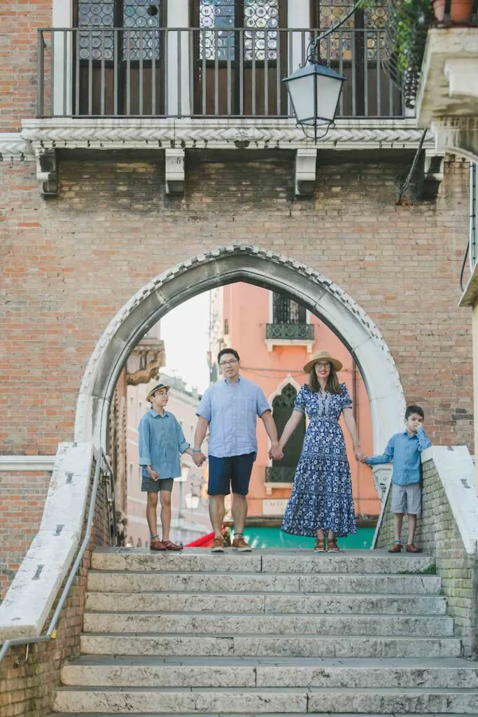 Image of a family wearing blue clothing during a Venice photo shoot