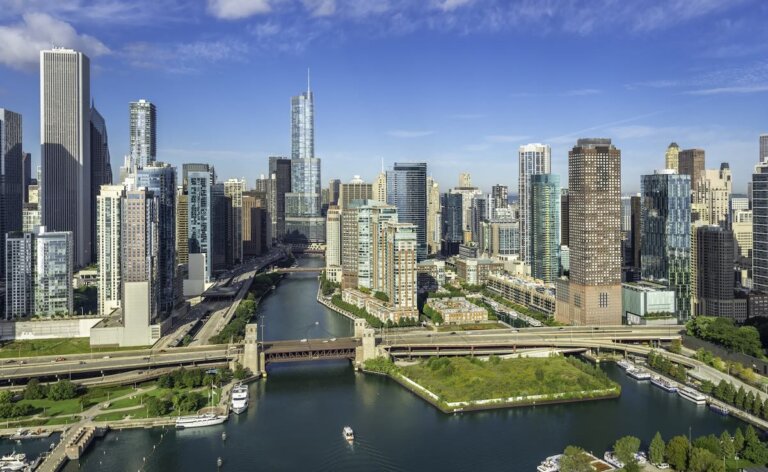 Check out these top Chicago tours for families recommended by top family travel blog Marcie in Mommyland. Image of City of Chicago Skyline aerial view with Chicago River