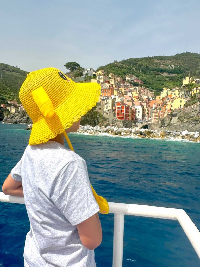 Image of a boy on a ferry in Cinque Terre ITaly