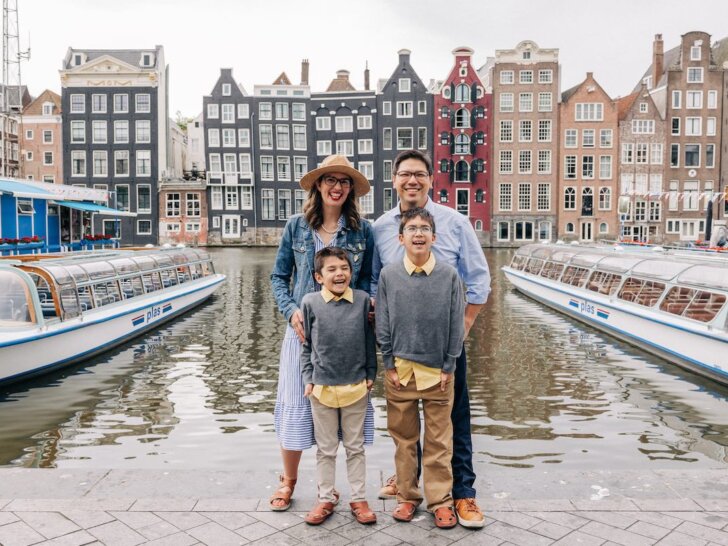 Find out how to spend 3 days in Amsterdam with kids with recommendations from top family travel blog Marcie in Mommyland. Image of a family of 4 in Amsterdam