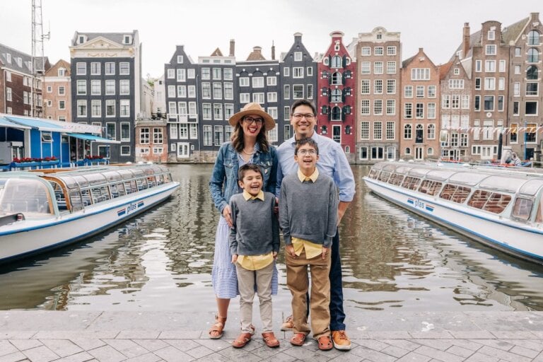 Find out how to spend 3 days in Amsterdam with kids with recommendations from top family travel blog Marcie in Mommyland. Image of a family of 4 in Amsterdam