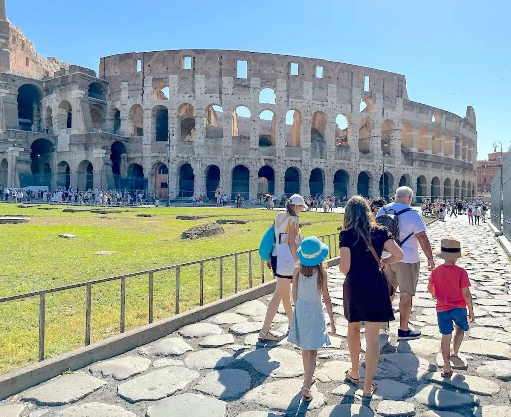 Image of people in front of the Colosseum in Rome