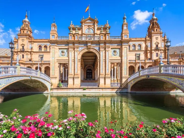 Find out how to plan a trip to Spain with tips by top family travel blog Marcie in Mommyland. Image of Seville, Spain at Spanish Square (Plaza de Espana).