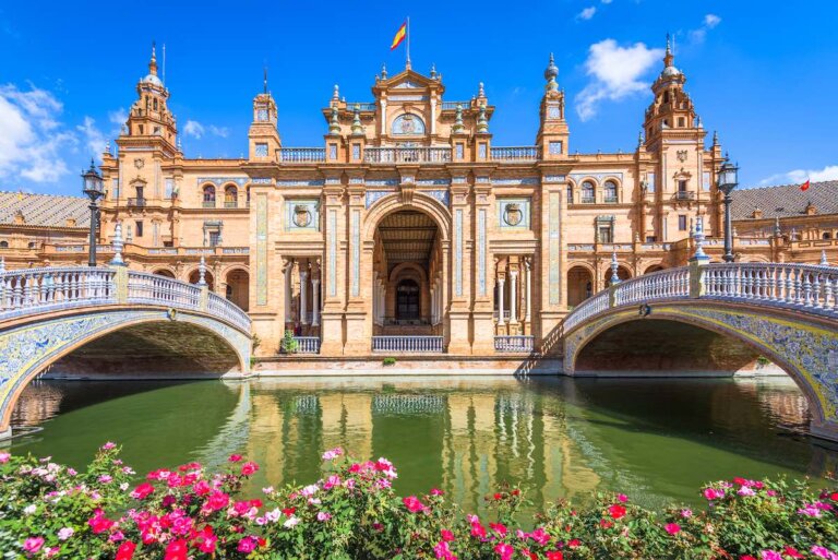 Find out how to plan a trip to Spain with tips by top family travel blog Marcie in Mommyland. Image of Seville, Spain at Spanish Square (Plaza de Espana).