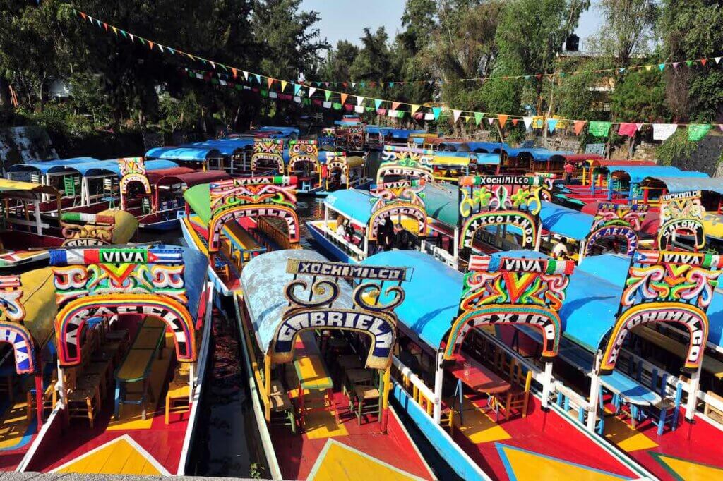 Colourful Mexican gondolas at Xochimilco's Floating Gardens in Mexico City.