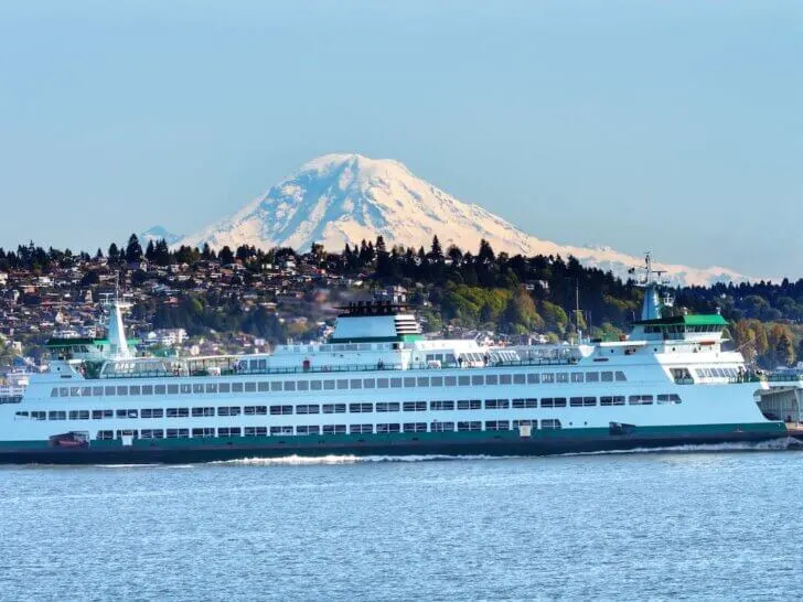 Find out the most scenic ferry rides in the U.S.A. recommended by top family travel blog Marcie in Mommyland. Image of Car Ferry Mount Rainier Puget Sound North Seattle Snow Mountain Washington State Pacific Northwest