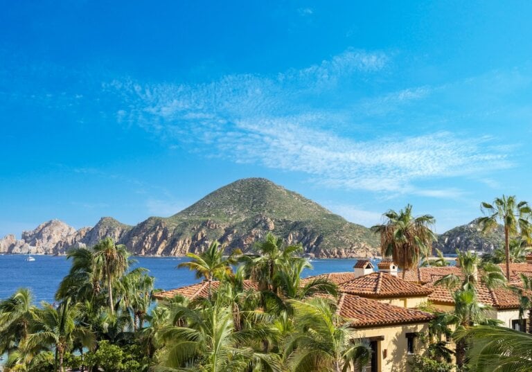 Find out the best day trips from Cabo San Lucas according to top family travel blog Marcie in Mommyland. Image of Scenic panoramic aerial view of Los Cabos landmark tourist destination Arch of Cabo San Lucas.