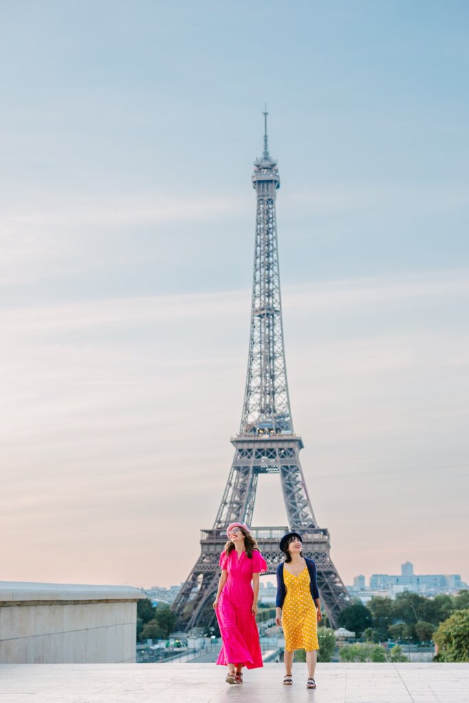 Image of two ladies in front of the Eiffel Tower in Paris