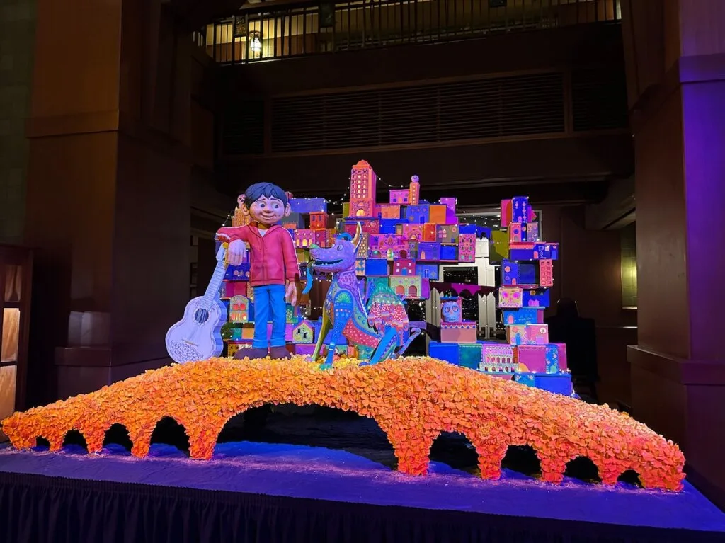 Image of a Coco gingerbread display in the lobby of the Disney Grand Californian Hotel