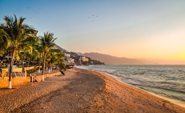 Check out these 12 day trips from Puerto Vallarta recommended by top family travel blog Marcie in Mommyland. Image of a Puerto Vallarta sunset