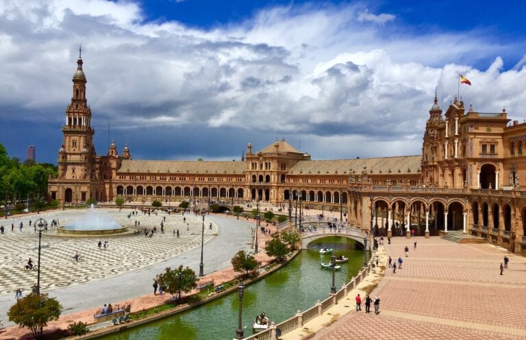 Check out the top tourist attractions in Seville Spain worth adding to your Spain itinerary. Image of a plaza in Seville
