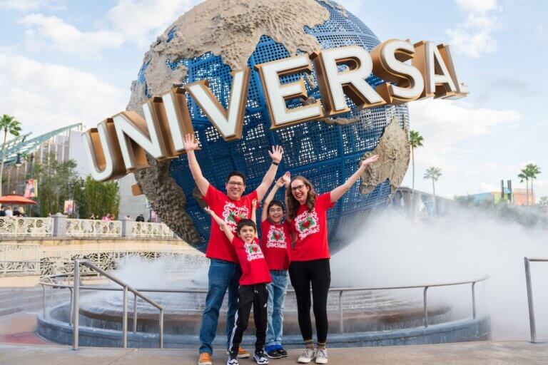 Check out these must-read Tips for Universal Studios Orlando by top family travel blog Marcie in Mommyland. Image of Marcie Cheung and her family at Universal Studios Florida. Photo credit: Sees the Day Photography