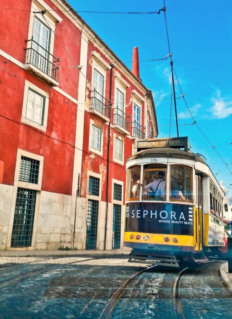 Image of a yellow tram in Lisbon