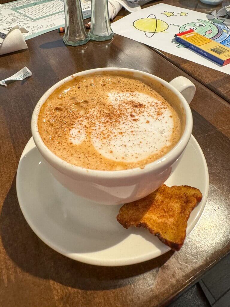 Image of a coffee cup and mini cinnamon toast. Photo credit: Marcie Cheung