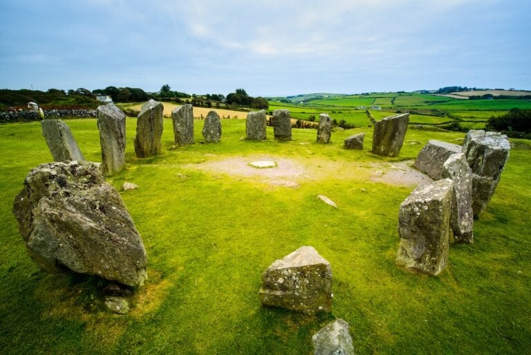 Check out these incredible hidden gems in Ireland recommended by top family travel blog Marcie in Mommyland. Image of Drombeg Stone Circle.
