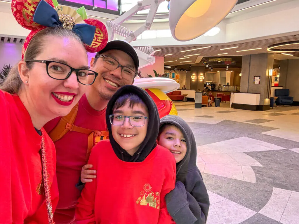 Image of Marcie Cheung and her family at the Pixar Place Hotel at Disneyland.