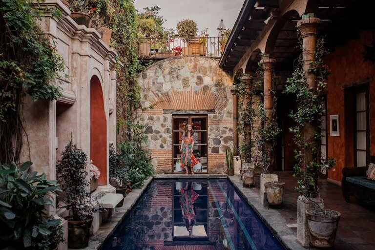 Find out the best hotels in Antigua Guatemala recommended by top travel blog Marcie in Mommyland. Image of Marcie Cheung at a hotel in Antigua