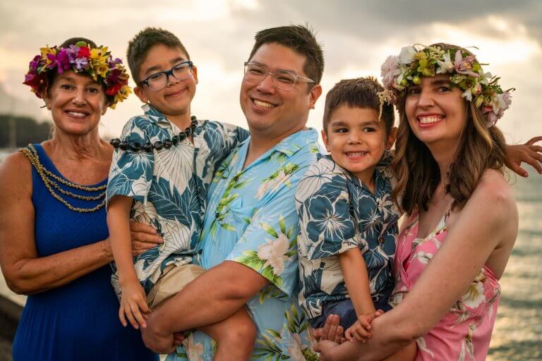 Find out the best tips for multigenerational travel by top family travel blog Marcie in Mommyland. Image of Marcie Cheung and her family in Hawaii