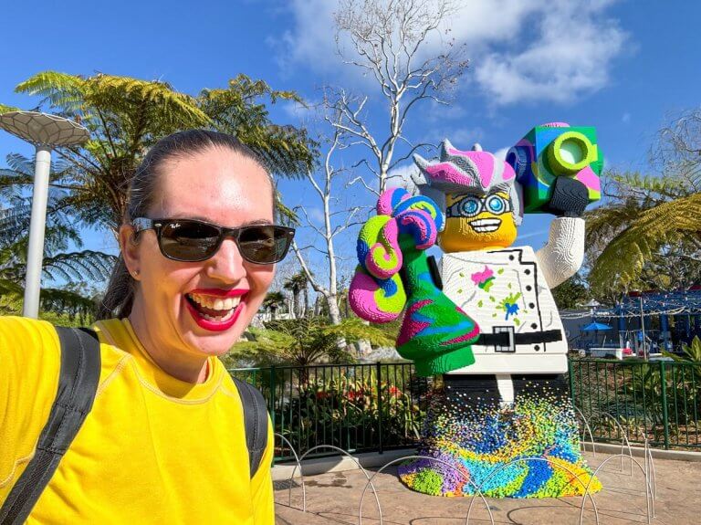 Find out why LEGOLAND might not be fun for adults and get tips by top family travel blog Marcie in Mommyland. Image of Marcie Cheung at LEGOLAND