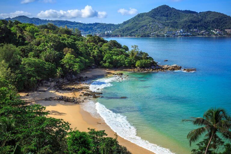 Find out the top Phuket day trips recommended by top family travel blog Marcie in Mommyland. Image of Laem Sing Beach, Phuket, Thailand