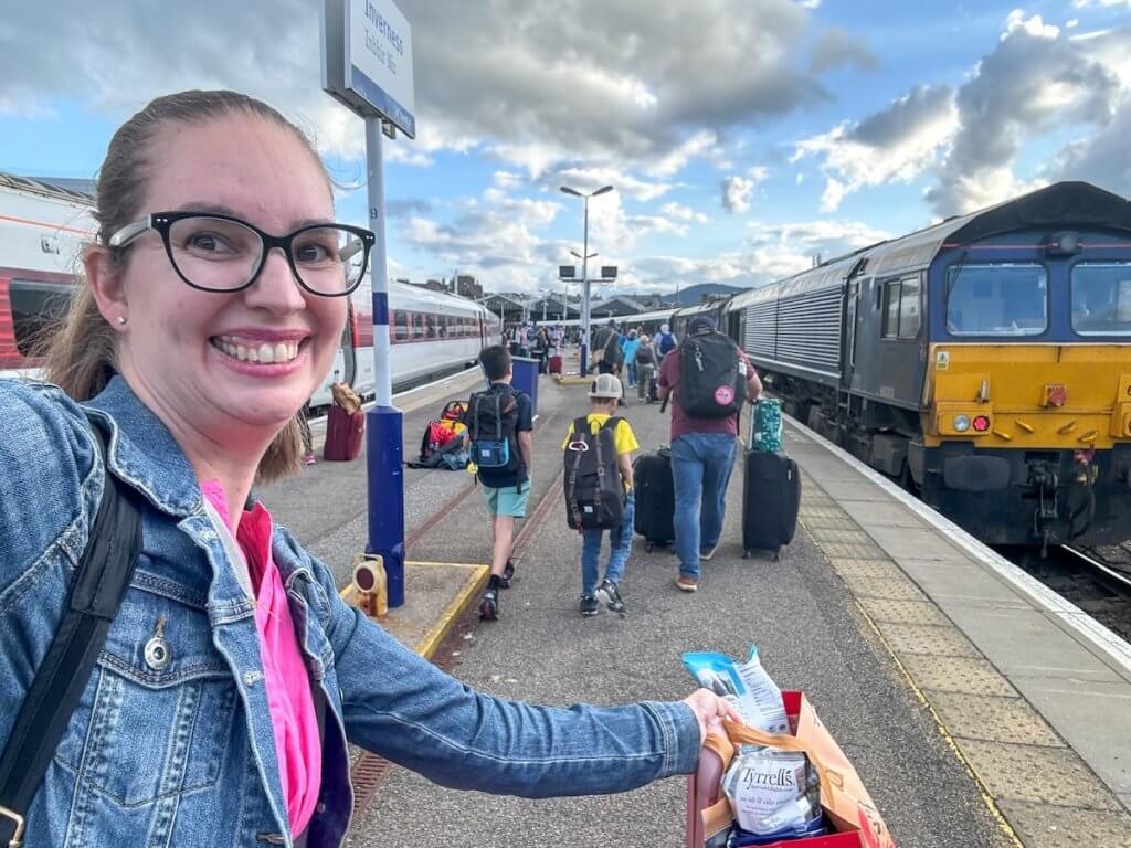 Image of Marcie Cheung and her family at the Inverness Train Station
