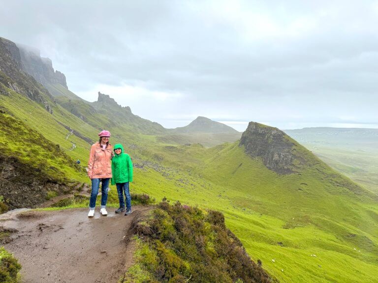 Find out the best things to do on the Isle of Skye in Scotland according to top family travel blog Marcie in Mommyland. Image of Marcie Cheung and her son at the Quiriang on the Isle of Skye