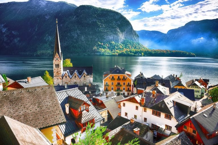 Find out the best cozy fall getaways for moms. Image of Hallstatt