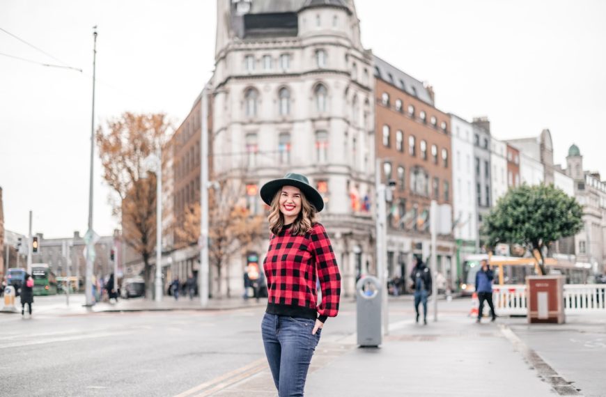 Find out what to pack for Ireland in December with tips from top family travel blog Marcie in Mommyland. Image of Marcie Cheung in Dublin