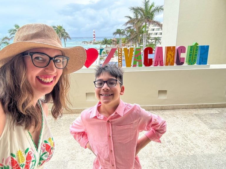 Find out the best Hyatt Ziva in Mexico: Cancun vs Los Cabos. Image of Marcie Cheung and her son at the Hyatt Ziva Cancun