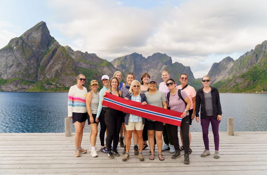 Find out how to spend 7 days in the Lofoten Islands in Norway. Image of Marcie Cheung and a group of women in Norway