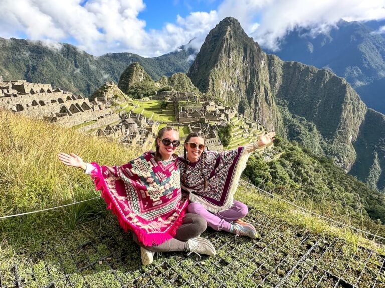 Check out this Peru itinerary that covers Arequipa, Cusco, Machu Picchu, and the Amazon. Photo of Marcie Cheung and Vanessa Hunt at Machu Picchu