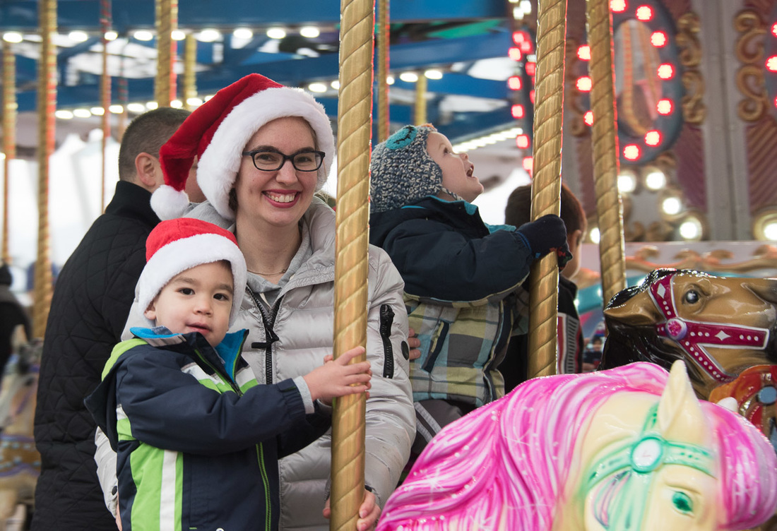 3 Things to Do in Vancouver BC during the Holidays featured by top Seattle travel blog, Marcie in Mommyland: Vancouver Christmas Market carousel