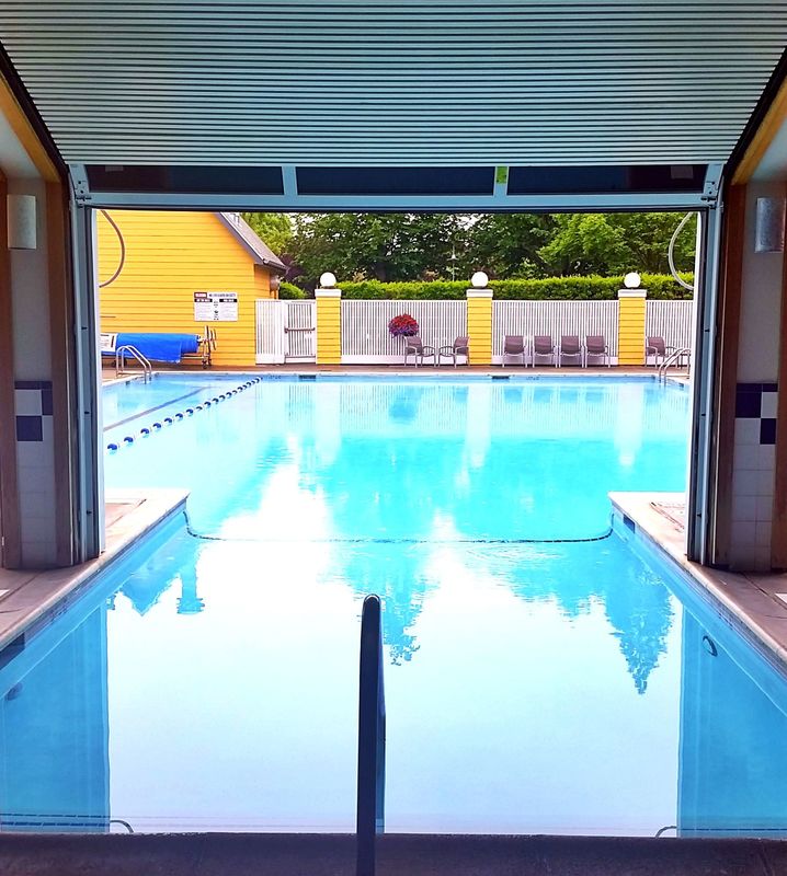Photo of the Semiahmoo Resort pool, which is both indoor and outdoor and is perfect for a family vacation #semiahmoo #pool #pnw #pacificnorthwest